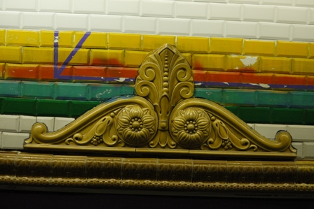 olive ceramic decorations on advertising frame