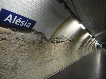 platform sign on half-broken wall