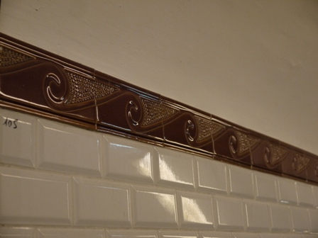 Brown creamic tiles with waves