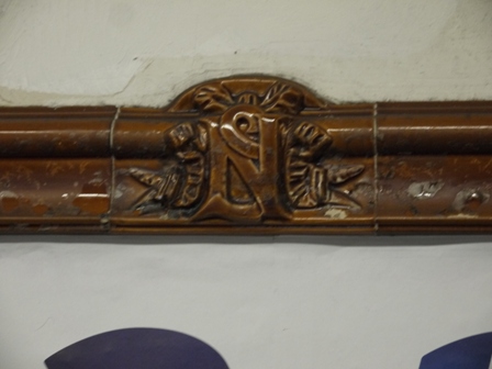 ceramic tile with Nord-Sud logo
